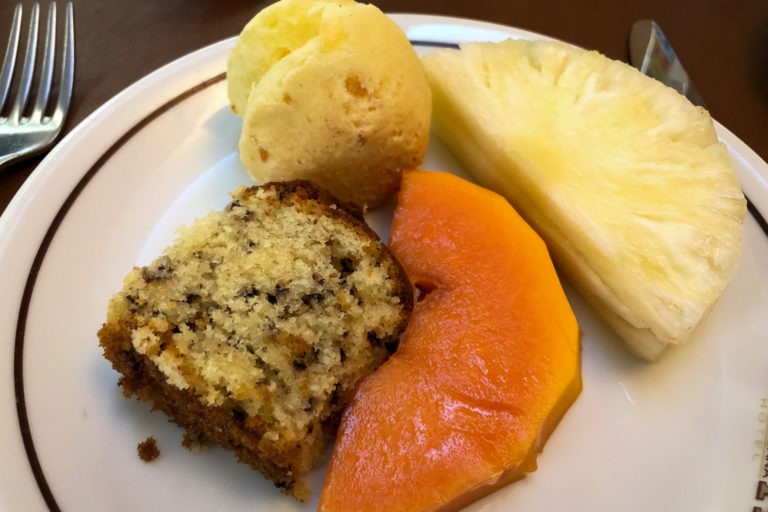 Coconut-chocolate-chip cake, papaya, pineapple, and cheese bread